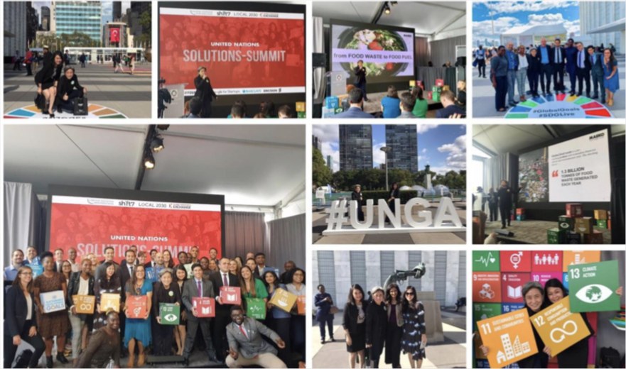 MAEKO at the United Nations Solution Summit 2019 in New York: the delegate group on stage holding Sustainable Development Goal cards.