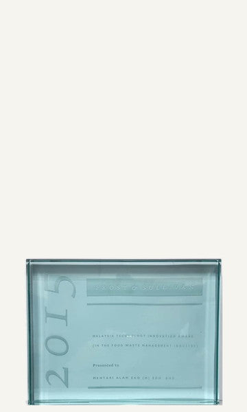 The 2015 Frost & Sullivan award, a slab of green-tinted glass